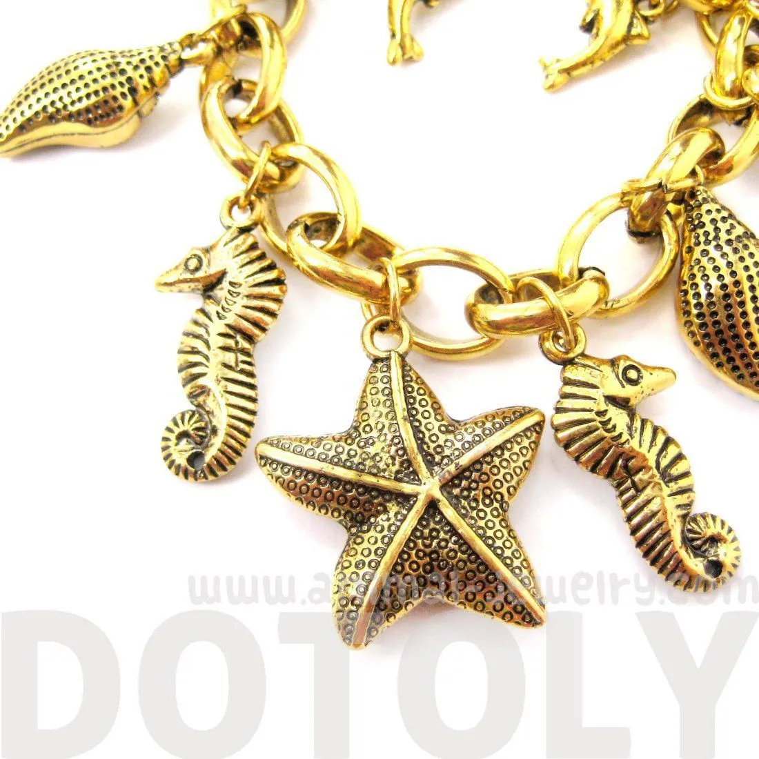 Sea Creatures Themed Charm Bracelet in Gold: Starfish Seahorse Seashell Dolphins